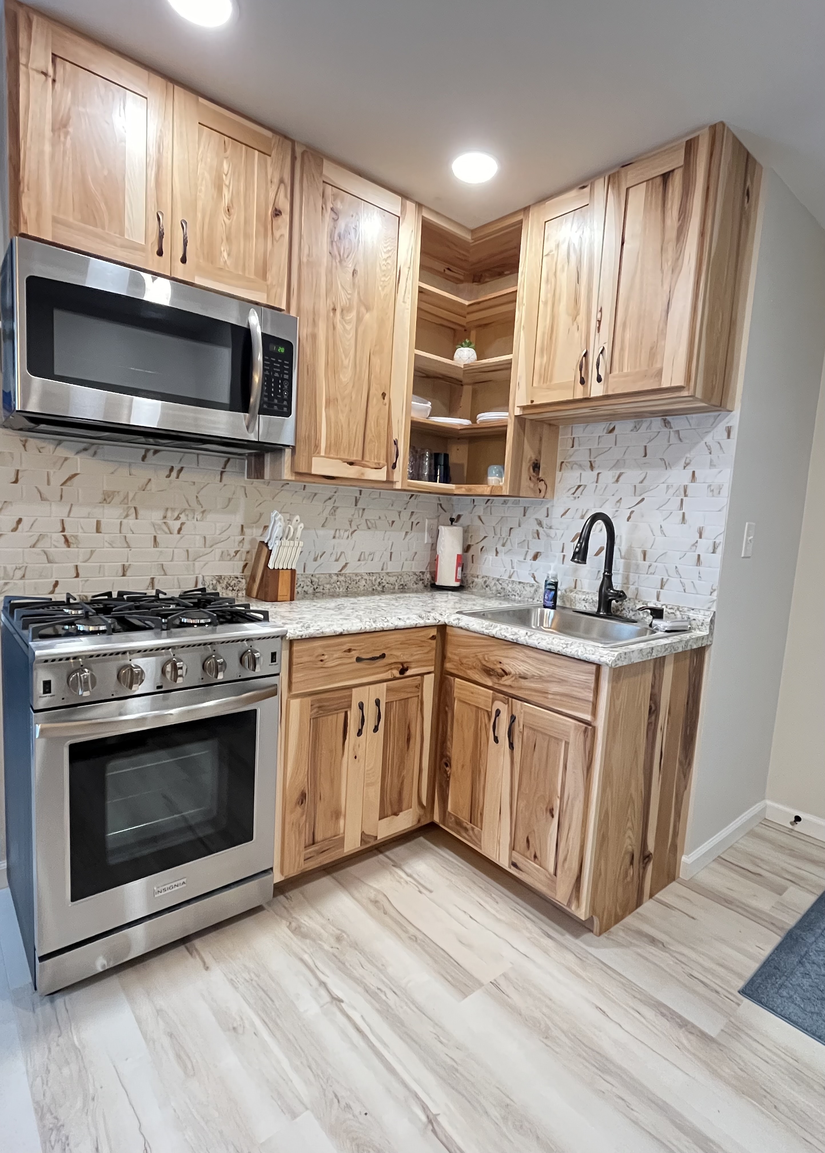 sandy beach michigan oscoda resort lake huron kayaking ausable river forest northern lights 